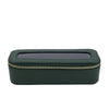 Green rectangular jewelry box with a gold zipper on a white background