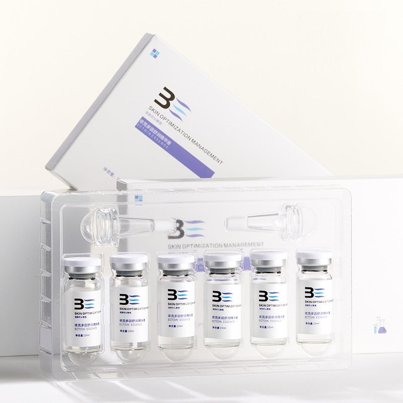 Set of medical vials with a branded box on a white background