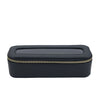 Black rectangular jewelry box with gold zipper on a white background