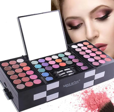 Makeup palette with colorful shades and a mirror, featuring the brand 'Miss Rose'.
